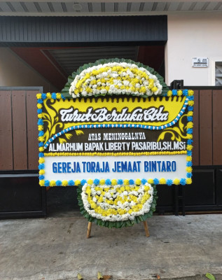 Papan Bunga Duka di Caturharjo