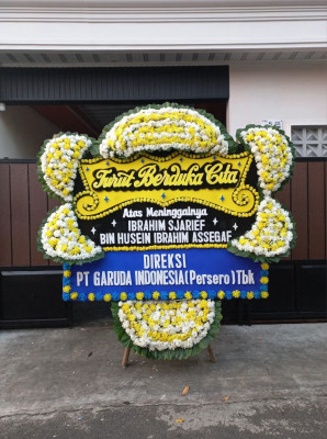 Papan Bunga Duka di Caturharjo